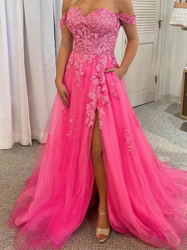 Model wearing an elegant off-shoulder tulle lace long prom gown with a high slit.