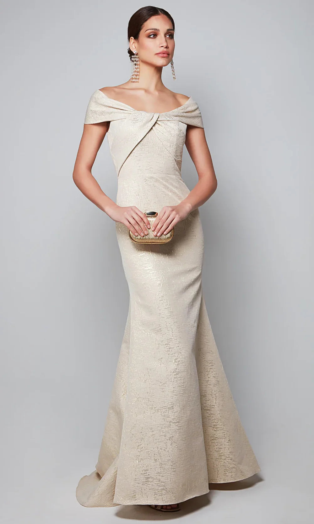 Close-up of the ruched bodice and jacquard fabric of the gown.
