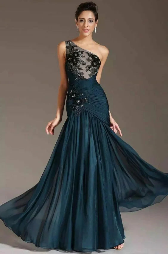 Woman wearing an elegant one-shoulder A-line prom gown with lace appliques.