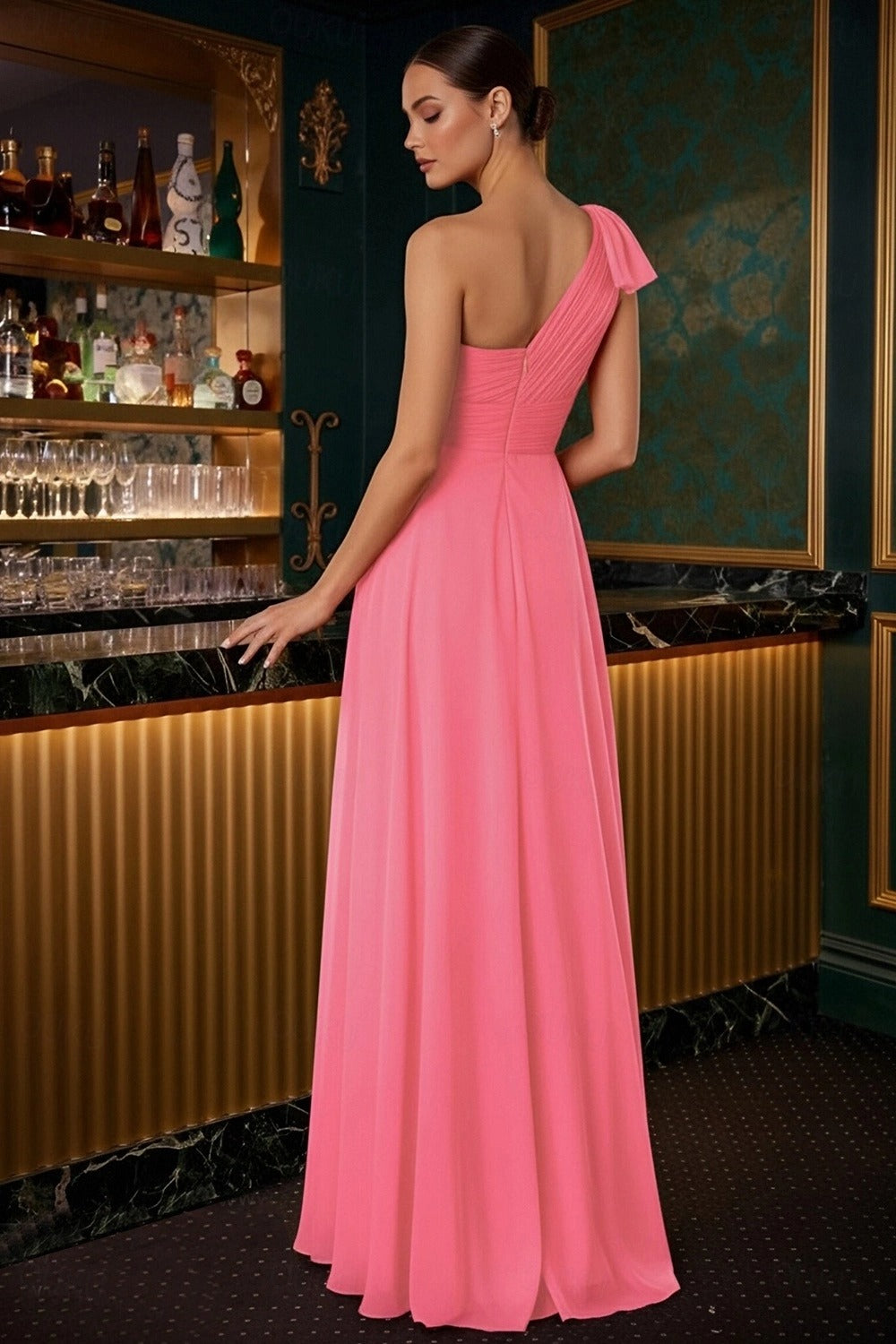 Side profile of the one-shoulder evening dress, highlighting the high slit.