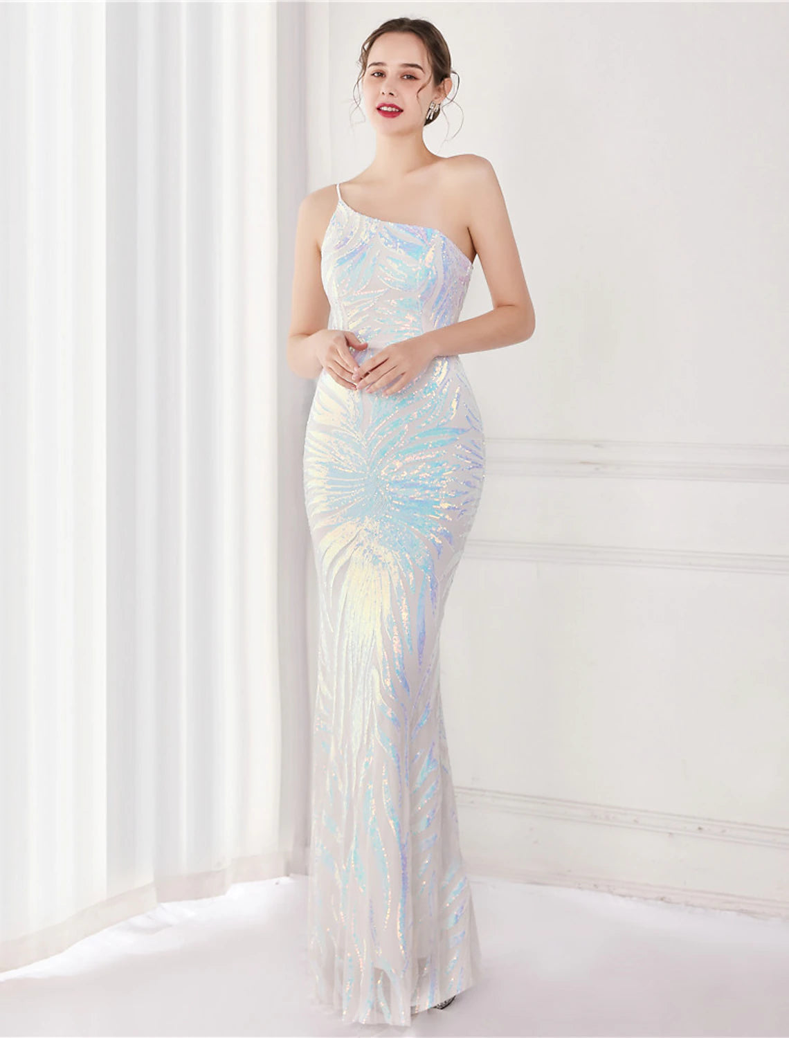Side view of sequined one-shoulder mermaid trumpet formal dress.