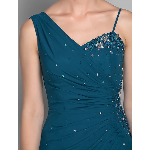 Detail of the one-shoulder neckline and bodice beading.