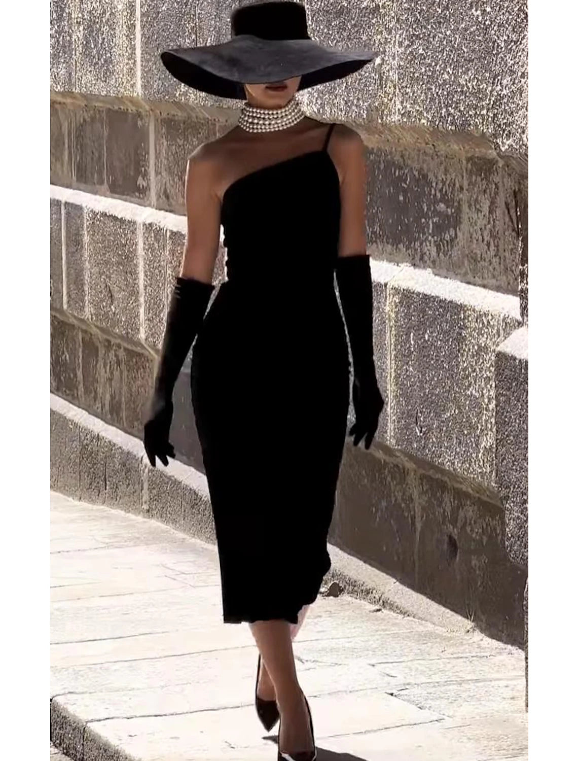 Elegant one-shoulder tea-length sheath cocktail dress with strappy detail.