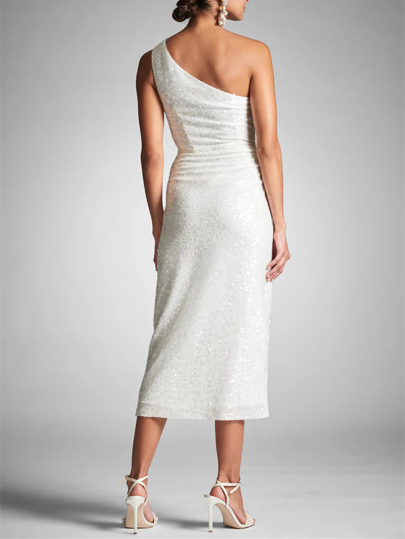 Back view of the one-shoulder tea-length homecoming dress.