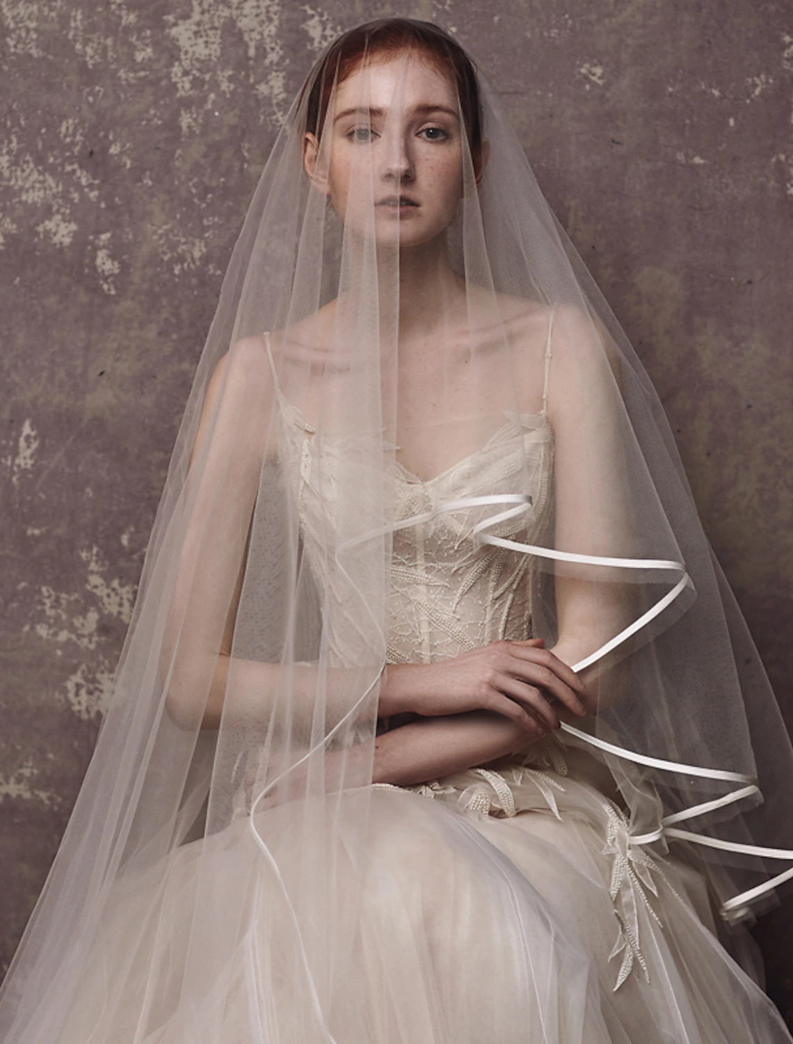 One-tier chapel wedding veil with sweet solid tulle, showcasing its elegant drape.