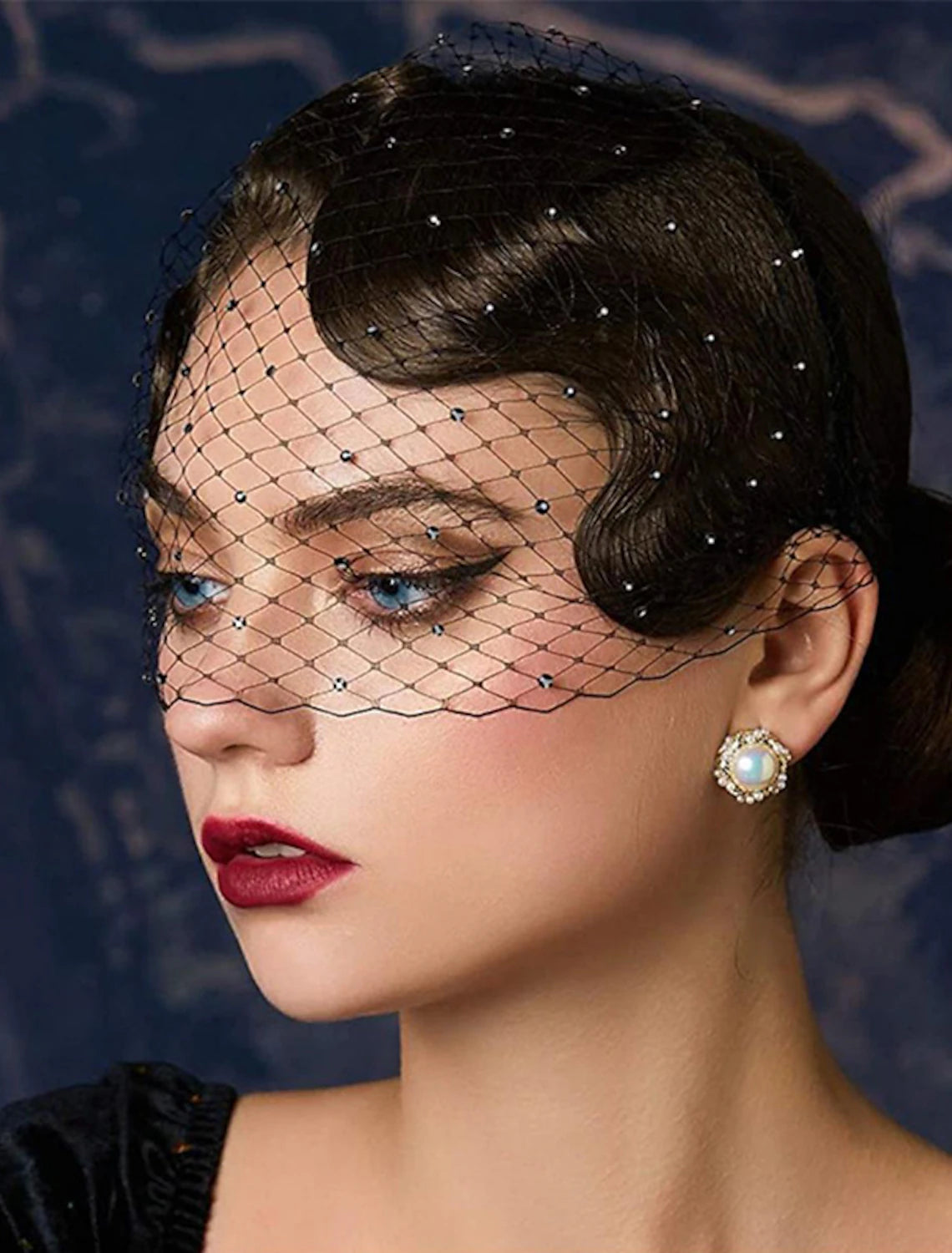 Close-up of a European-style blusher wedding veil, showcasing delicate crystal and rhinestone embellishments.