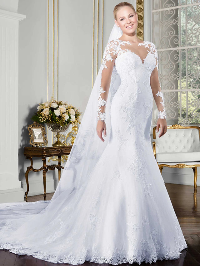 Elegant mermaid wedding dress with long sleeves and illusion neckline.