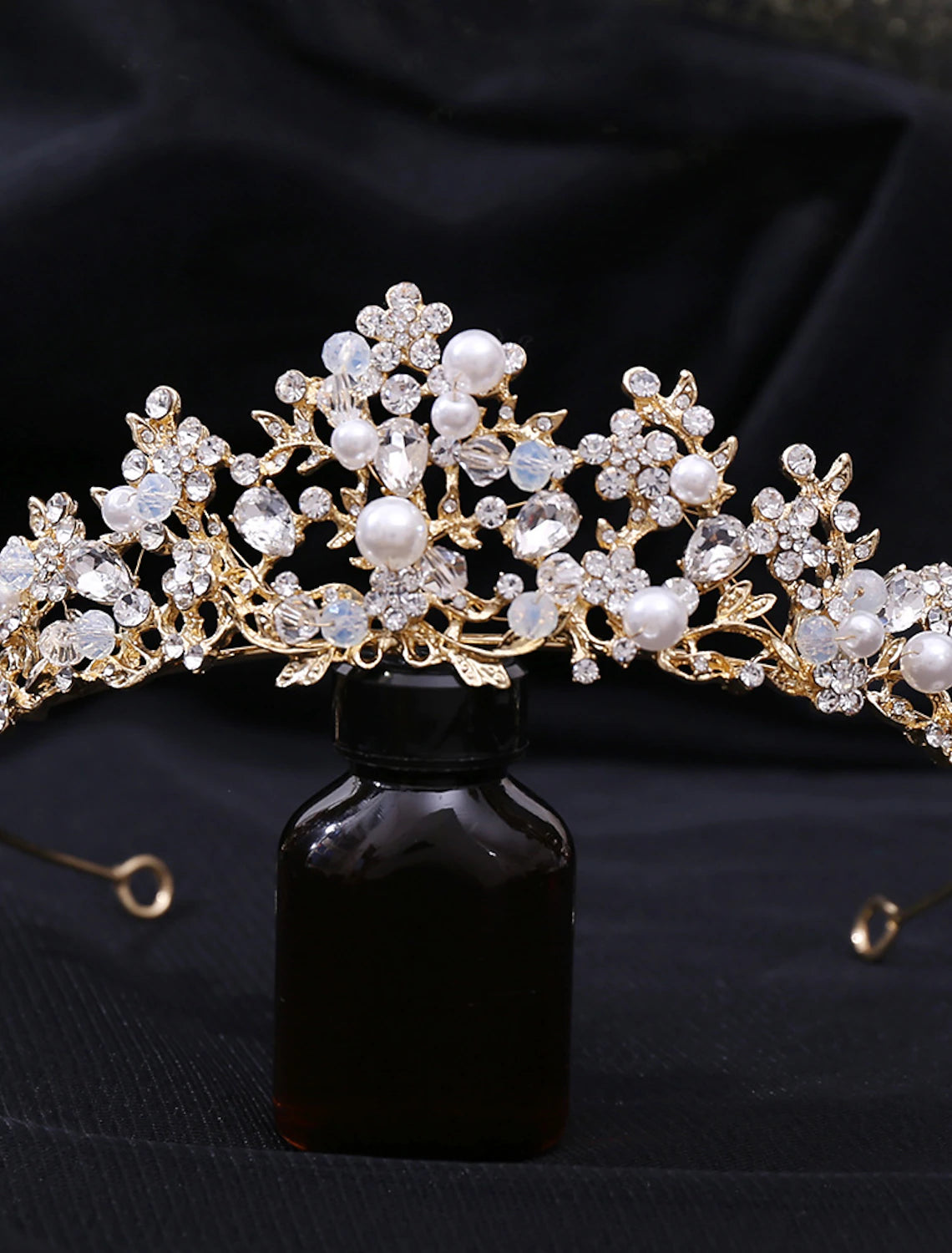 Side view of the retro-sweet pearl and crystal bridal headpiece.