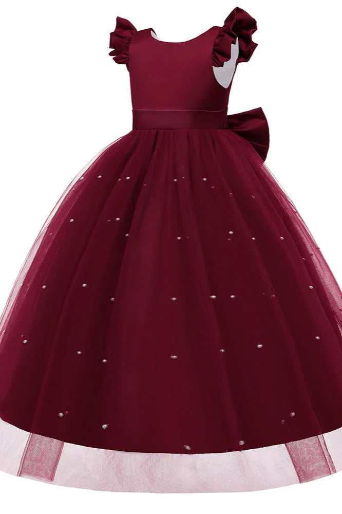 Elegant white flower girl dress with a sheer pearl tulle overlay.