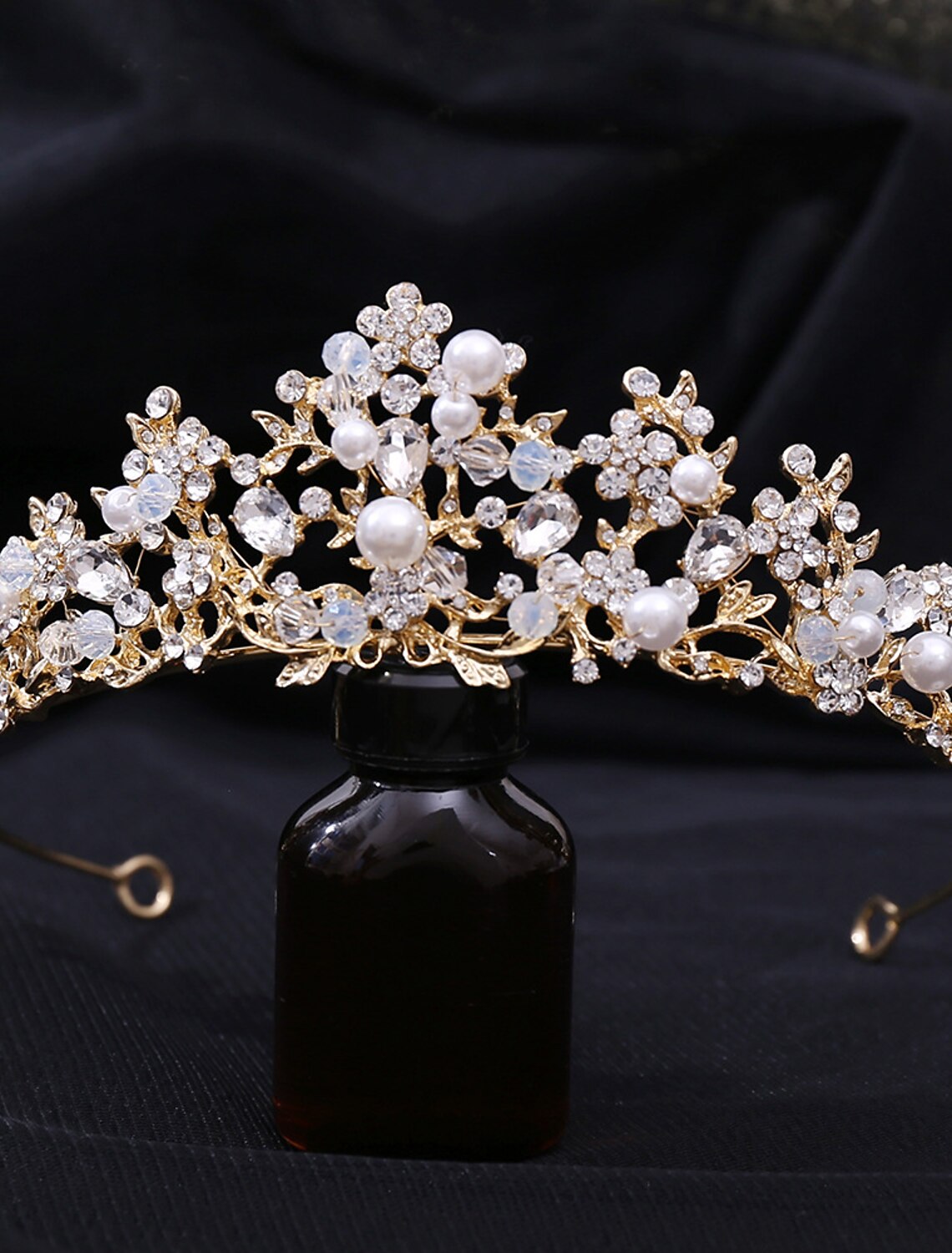 Beautiful headwear with crystal and pearl accents for special occasions.