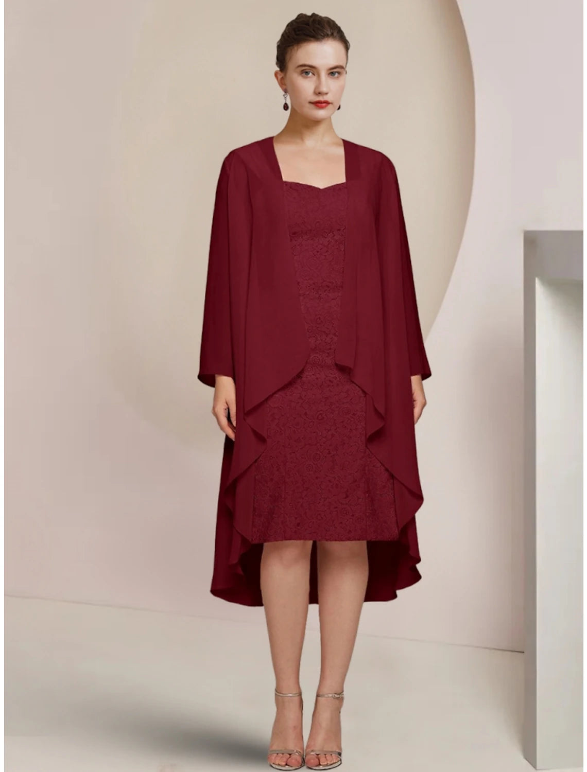 Elegant A-line mother of the bride dress with square neck and long sleeves.