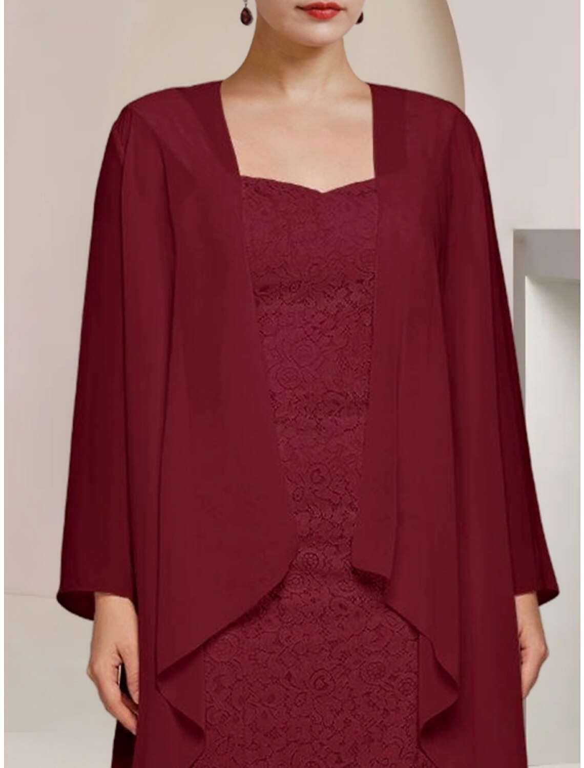 Model wearing a flowing chiffon A-line dress, perfect for special occasions.