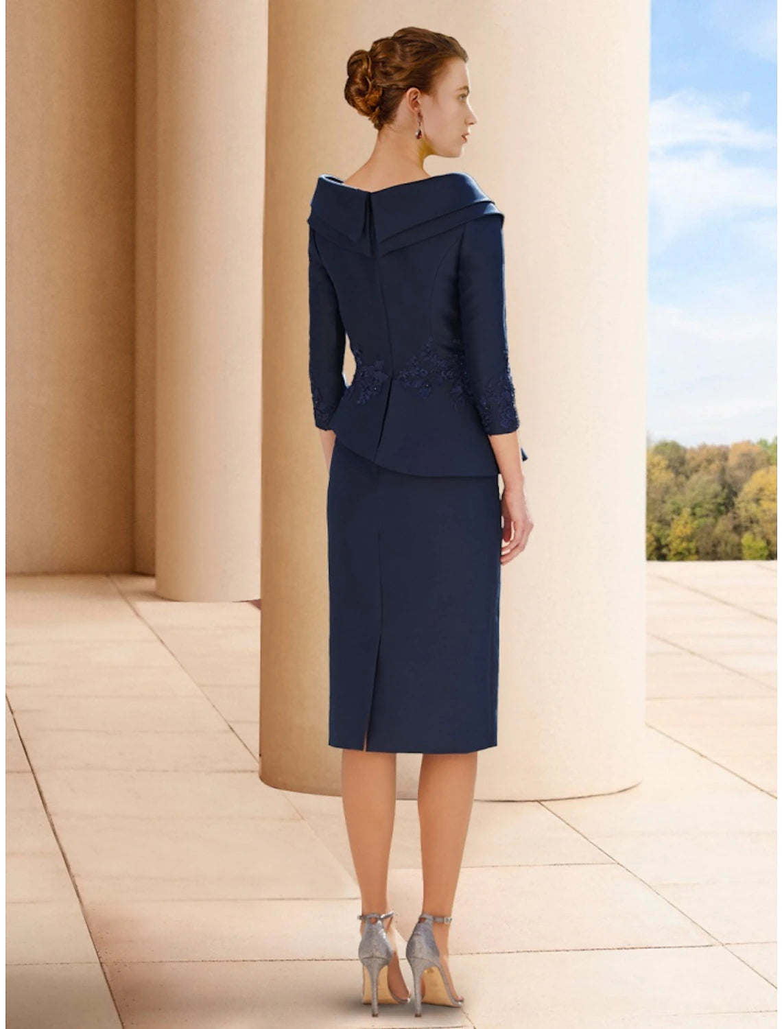 Side view of the elegant petite A-line V-neck satin dress, showcasing the knee-length hem.