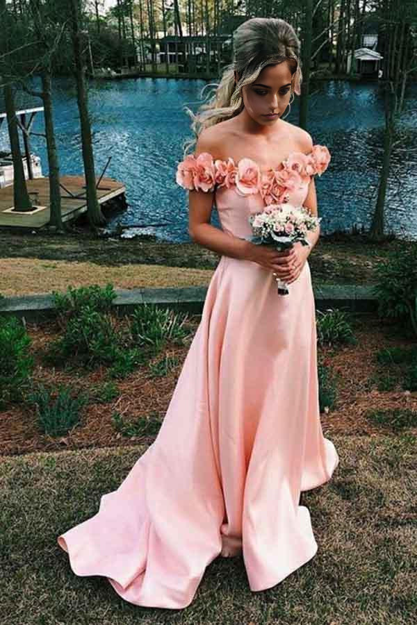 Elegant pink A-line off-shoulder satin prom dress with floral appliques and a sweep train.