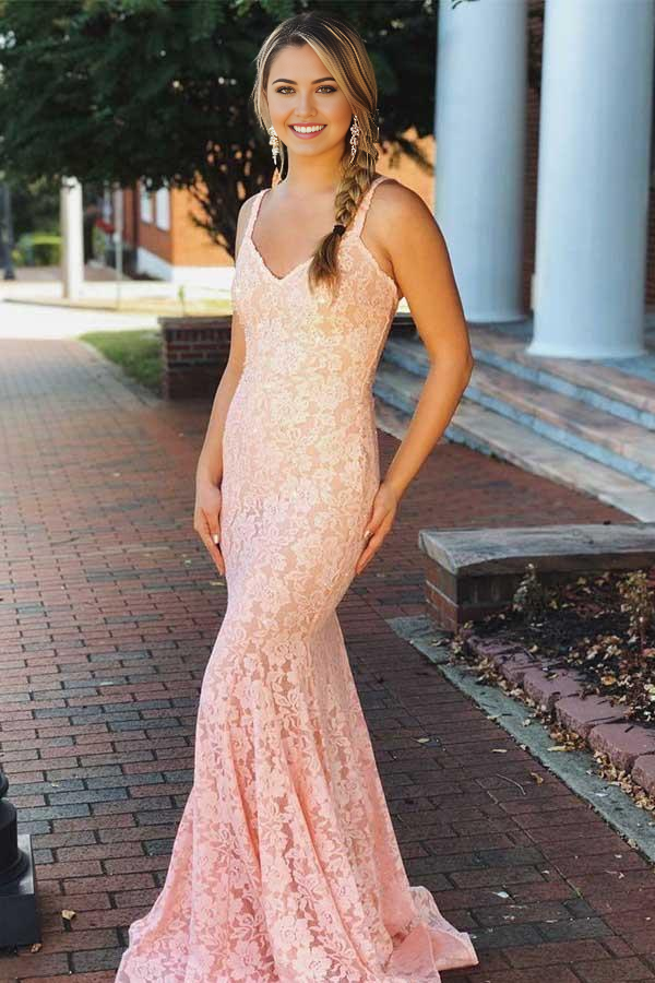 Elegant pink mermaid prom dress with V-neck and intricate beading.
