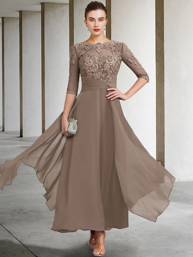 Plus size A-line mother of the bride dress with jewel neck, half sleeves, ruched bodice, and beading appliques.