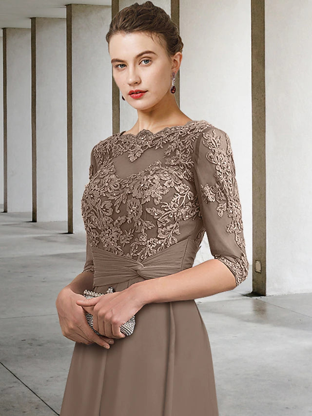 Back view of an elegant plus size A-line chiffon lace dress, showing ankle length and delicate details.