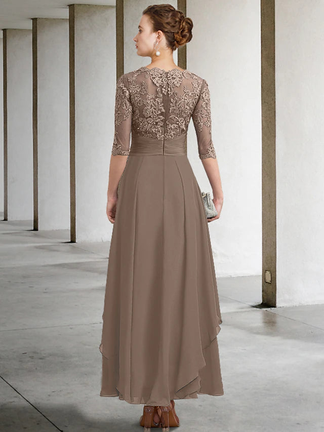 Close-up of the ruched bodice and beading appliques on a plus size mother of the bride dress.