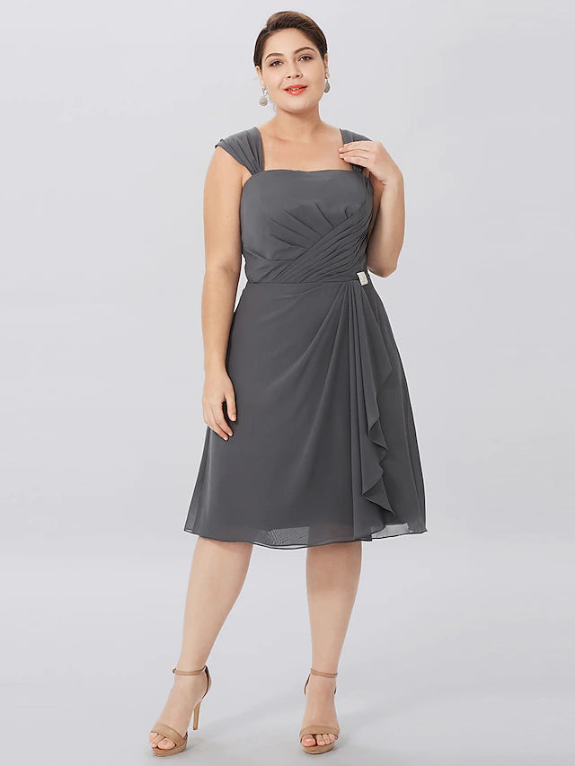 Close-up of the criss cross pleats on the A-Line dress.