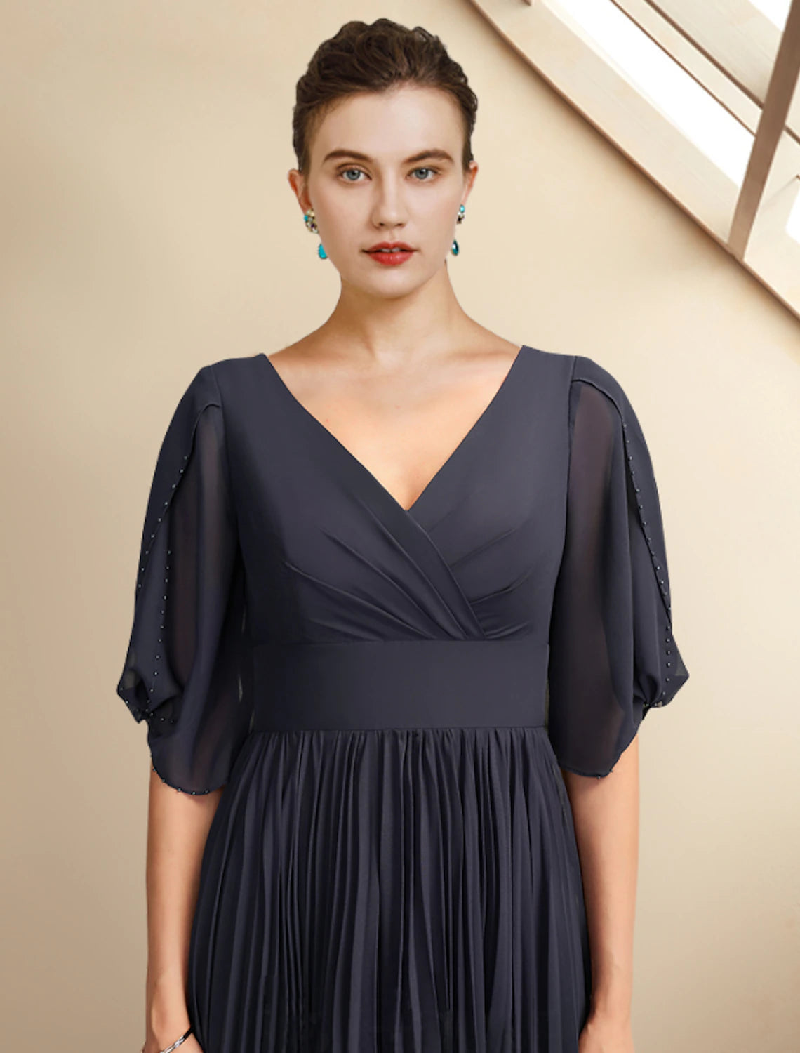 Side view of the elegant A-line plus size dress, highlighting the tea length.