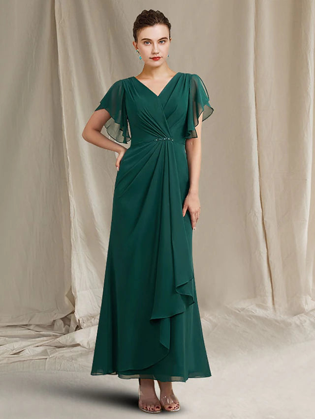 Elegant A-Line chiffon Mother of the Bride dress with jewel neck and short sleeves.