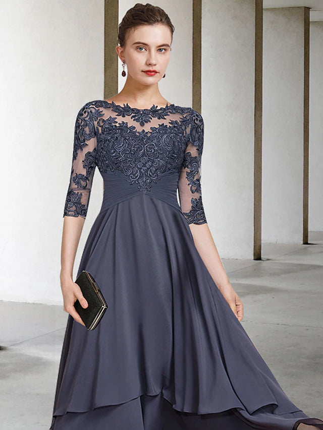 Back view of the A-line Mother of the Bride dress showing high-low tea length hem.