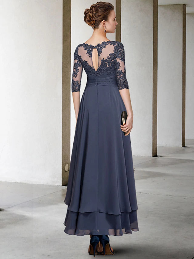 Close-up of the chiffon and lace fabric with ruched beading and appliques on the dress.
