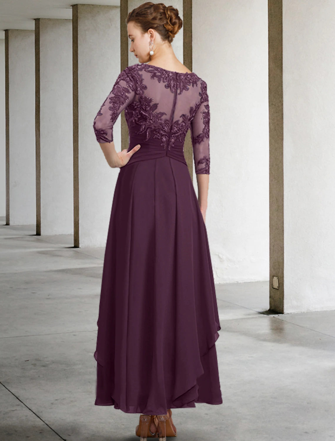 Detail of the ruched chiffon and lace fabric on the dress.
