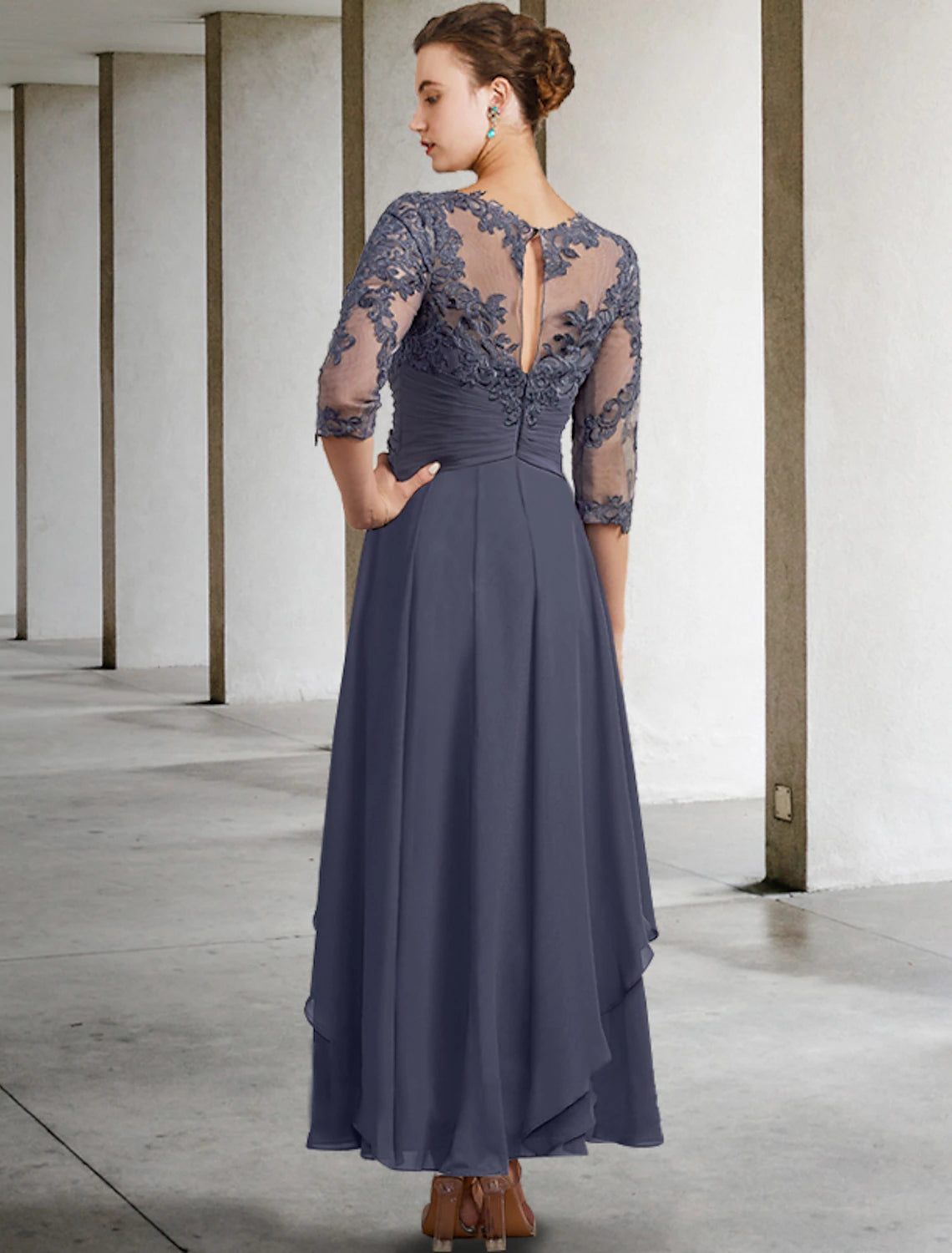 Back view of the elegant lace and chiffon Mother of the Bride gown.