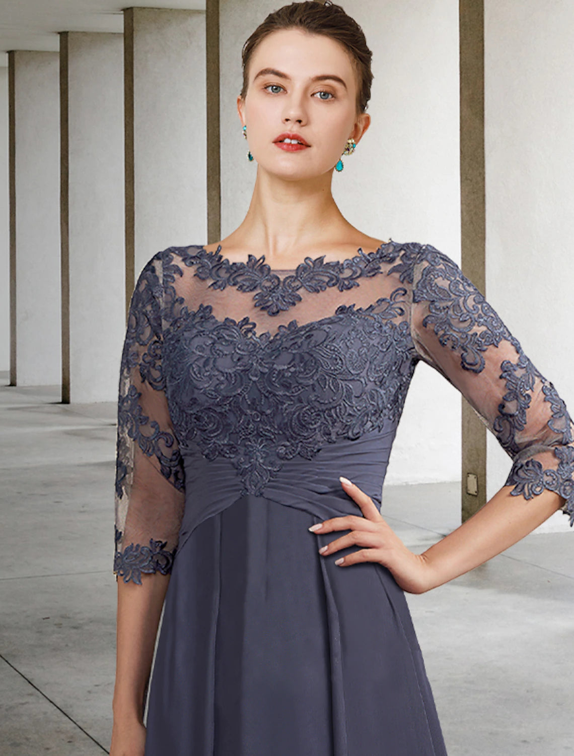 Close-up of the lace and applique details on the Mother of the Bride dress.