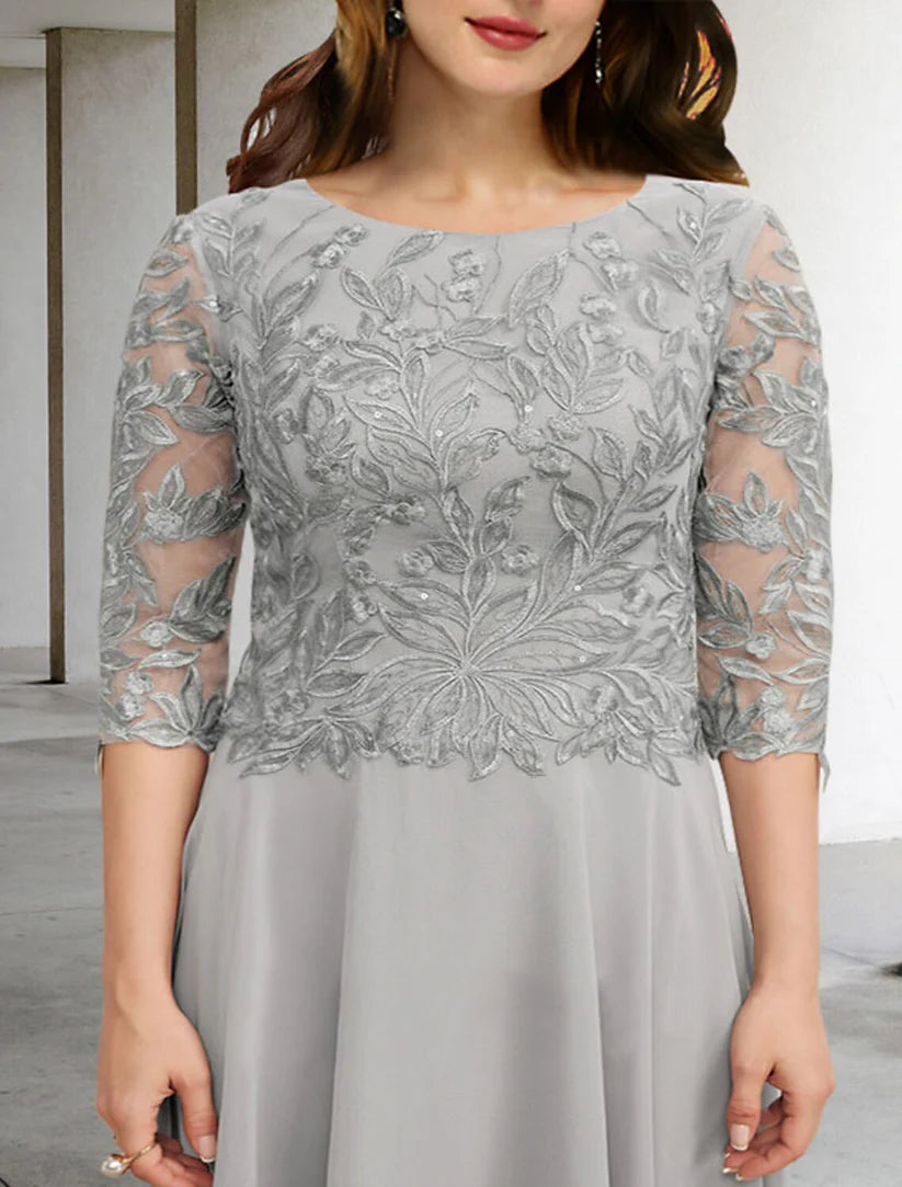 Mother of the Bride tea length dress, showing V-neck and 3/4 sleeve detail.