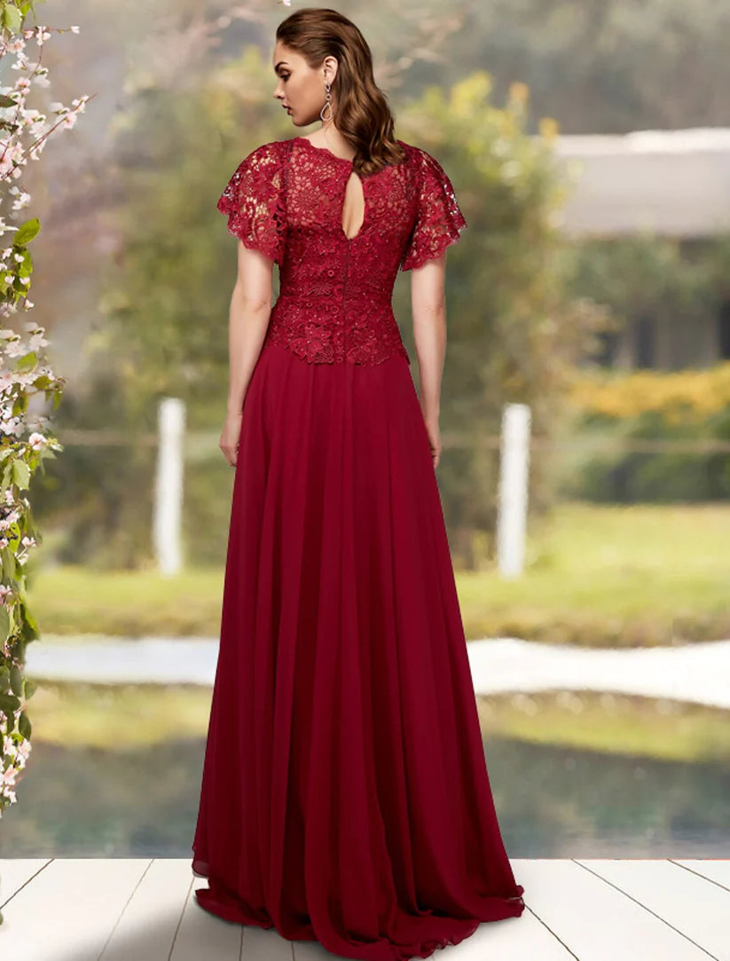 Side view of a plus size A-line formal dress featuring short sleeves and chiffon lace.
