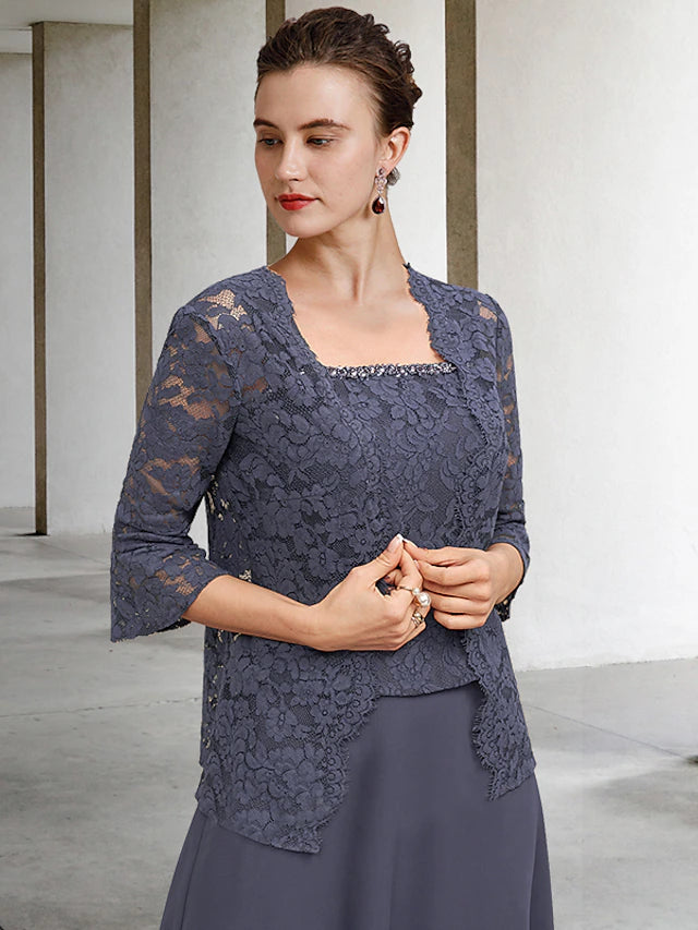 Back view of the elegant plus size A-line Mother of the Bride dress with a flowing jacket.