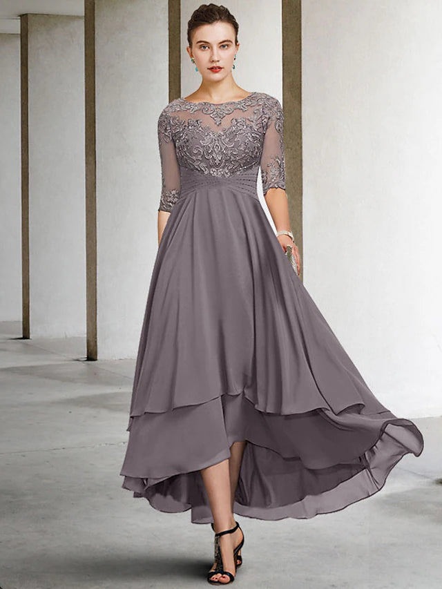 Elegant plus size A-line Mother of the Bride dress with jewel neck and half sleeves.