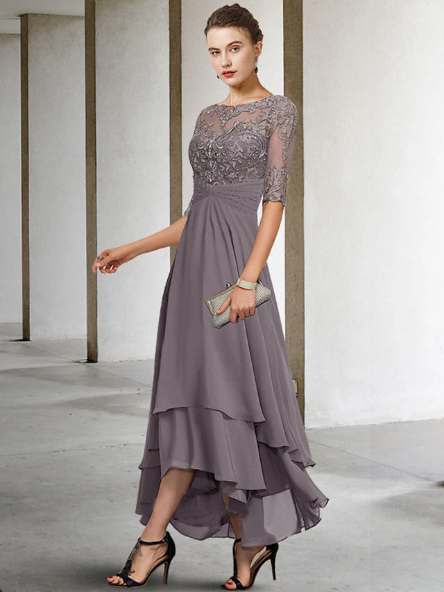 Side view of the plus size A-line Mother of the Bride dress, showing high-low hem.