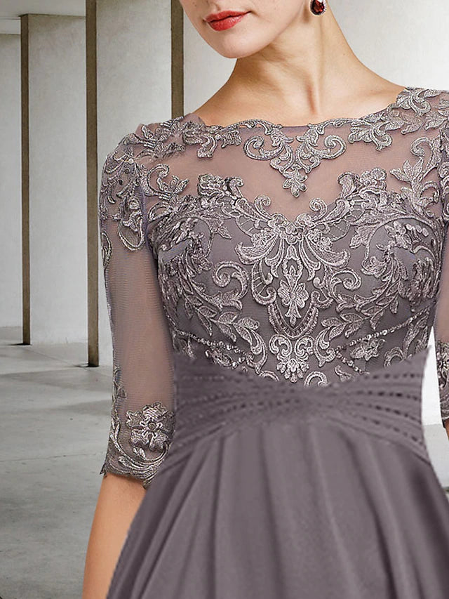 Close-up of the chiffon lace fabric, beading, and ruffles on the Mother of the Bride dress.