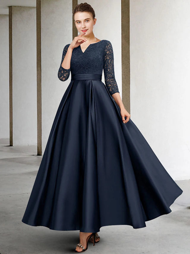 Plus size A-line Mother of the Bride dress with V-neck and 3/4 sleeves.