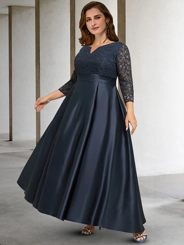 Elegant plus size A-line mother of the bride dress in dark blue, featuring a V-neck and 3/4 sleeves.