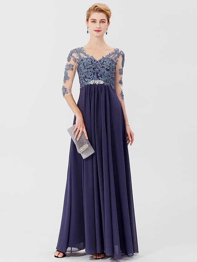 Back view of a formal A-line chiffon gown with crystal appliques.
