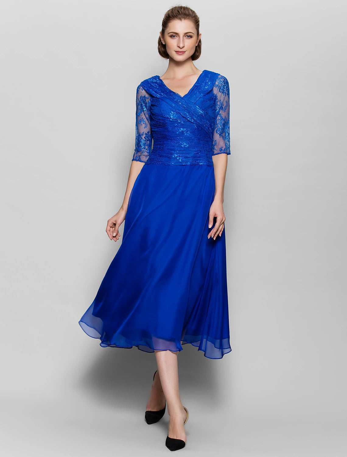 Elegant plus size A-line V-neck tea length dress in plum.