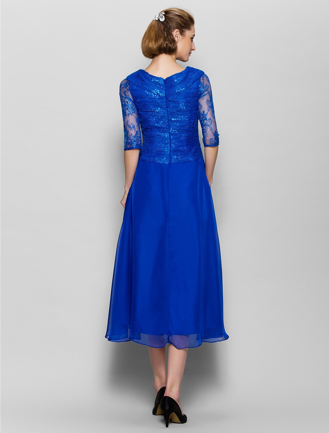 Full length view of the plum A-line dress, suitable for formal events.