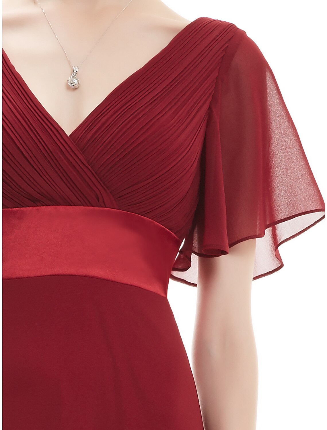 Side view of the elegant plus size Mother of the Bride dress.