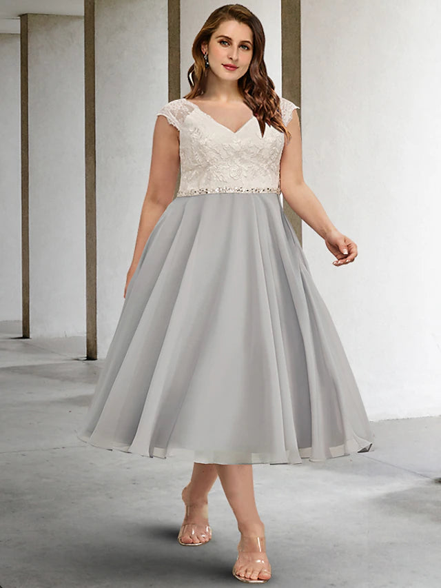 Plus size A-line V-neck tea length Mother of the Bride dress.