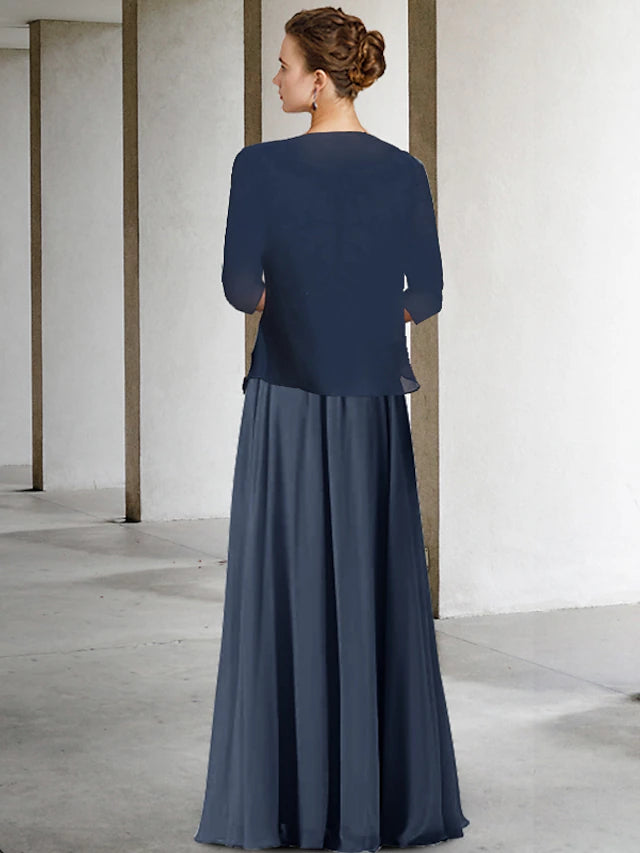 Back view of the high-low chiffon Mother of the Bride dress with pleats.