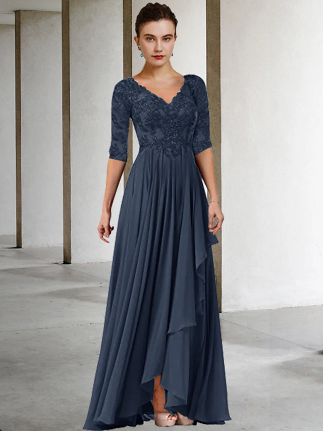 Side view of the two-piece A-line dress showing lace appliques and jacket.