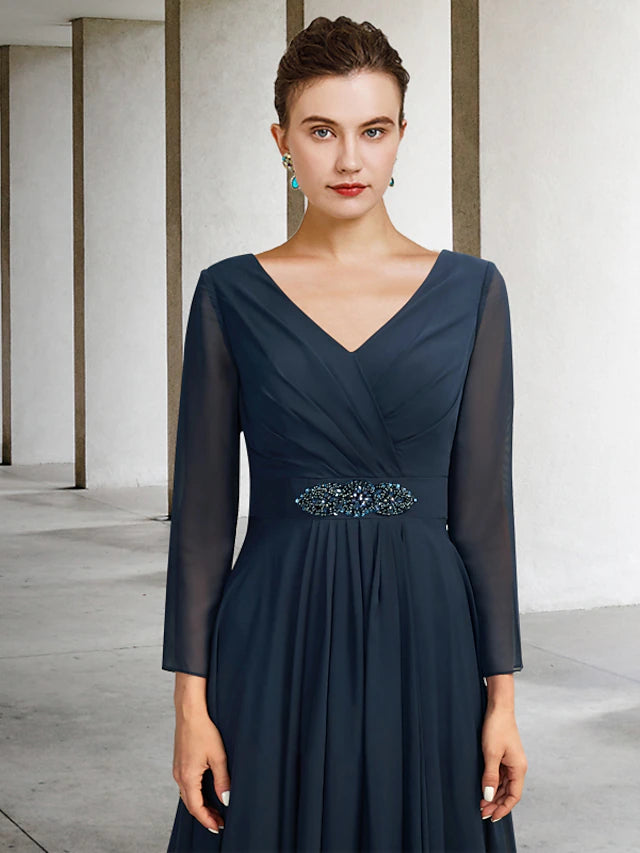 Back view of the plus size A-line Mother of the Bride dress with high-low hem.