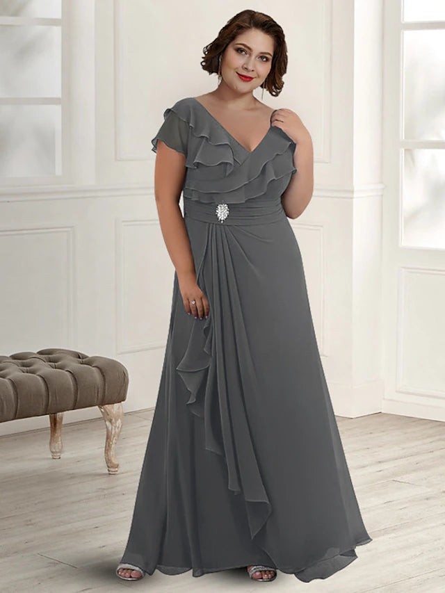 Elegant plus size A-line chiffon V-neck gown with short sleeves and pleats.