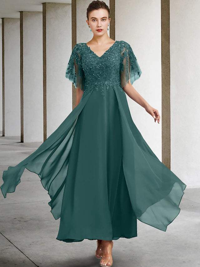 Full length view of the Mother of the Bride dress, showing flow of chiffon.