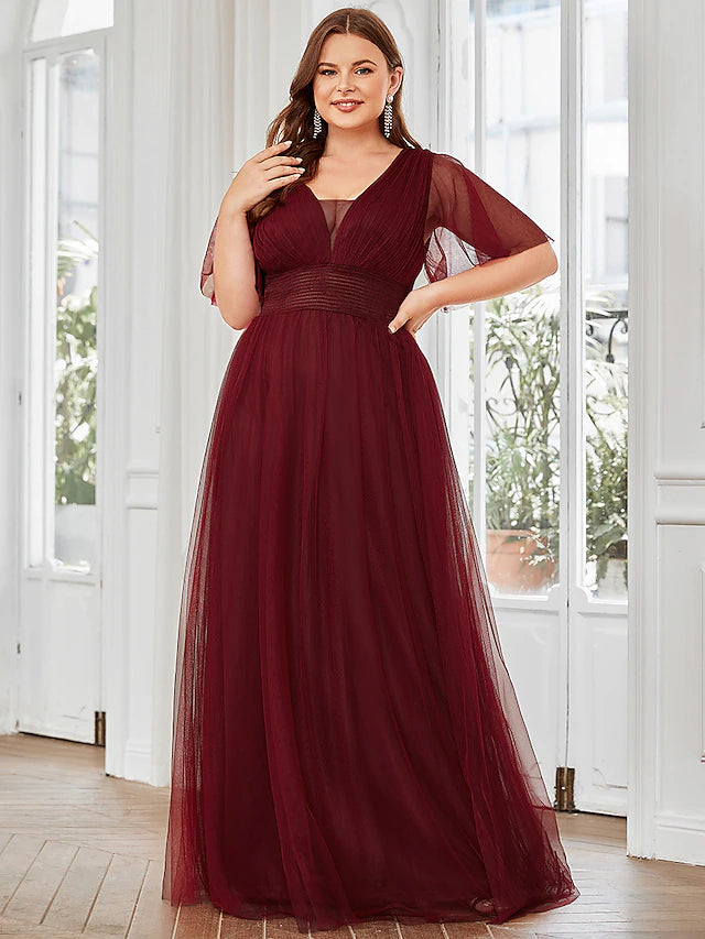 Close-up of the ruffled tulle detail on the short sleeve bridesmaid dress.