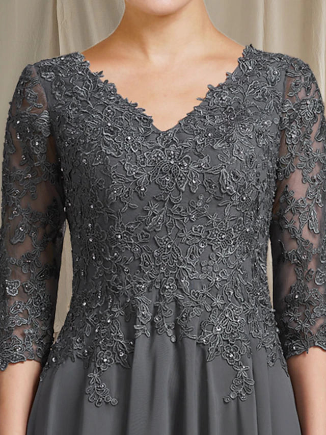 Side view of an elegant plus size A-line Mother of the Bride dress, showcasing tea length.